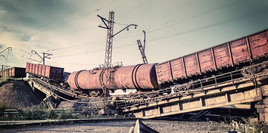 destroyed bridge with wagons