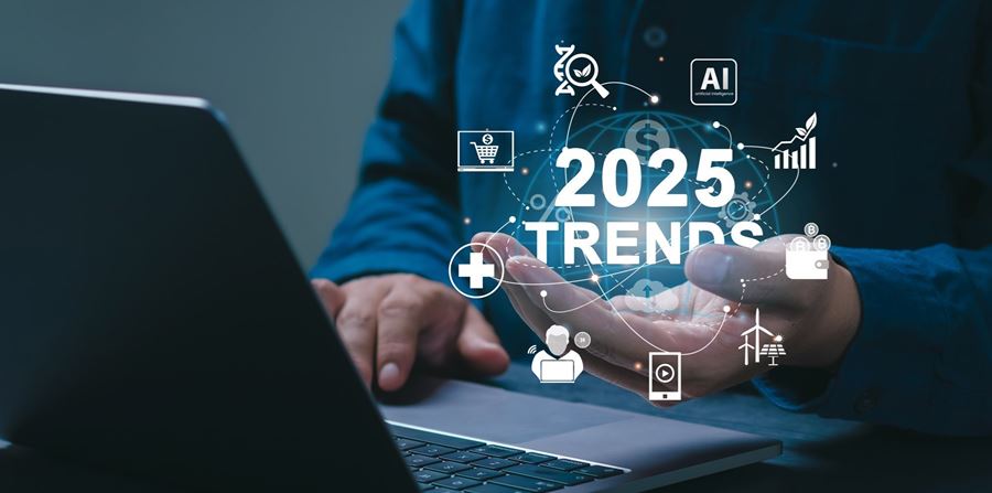 2025 trends concept businessman working on laptop and holding 2025 trends icons on sgreen future technological advancements world business trend online technology new business opportunities