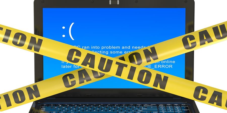 laptop with blue error screen