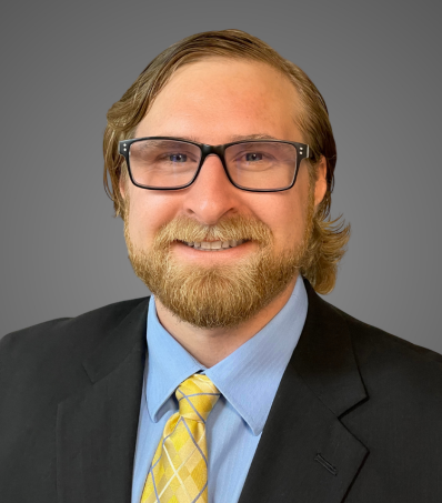 andy neufeld gray background headshot