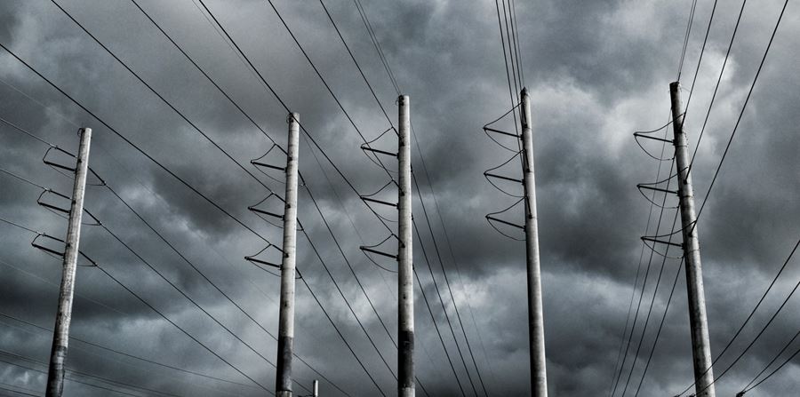 Tropical storm rolls in over city power supply stock photo