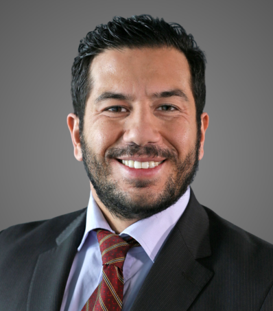 arash hajjam gray background headshot